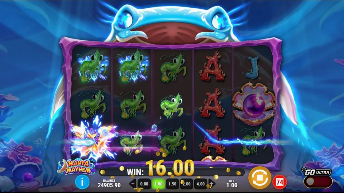 Tampilan visual slot Manta Mayhem dengan latar belakang terumbu karang yang cerah dan ikan pari biru.